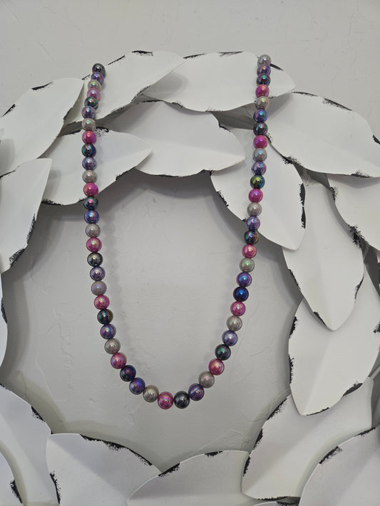 Lanyard with pearlized specialty beads.