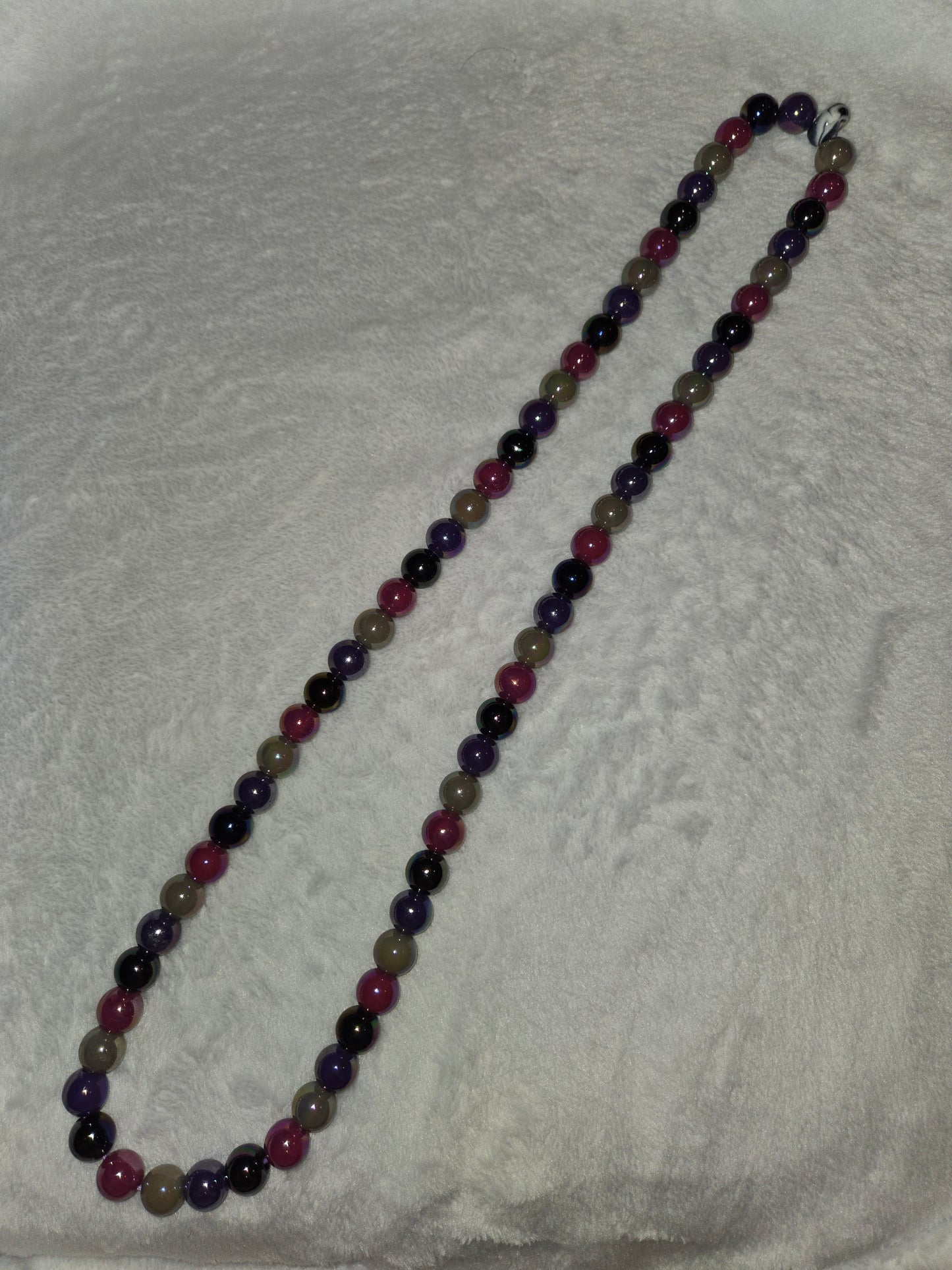 Lanyard with pearlized specialty beads.